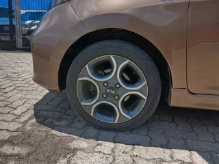 Brown Kia Picanto 1.0 with 94000km available now!