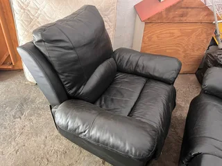 2 leather couches . One two seater one 2 seater
