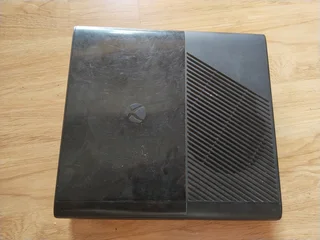 Xbox 360 with WWE 2K16 game disc