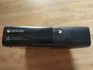 Xbox 360 with WWE 2K16 game disc