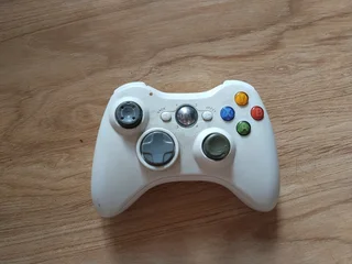 Xbox 360 with WWE 2K16 game disc