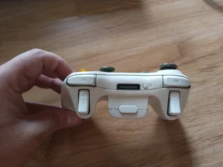 Xbox 360 with WWE 2K16 game disc