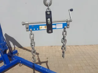 Engine hoist and load leveler