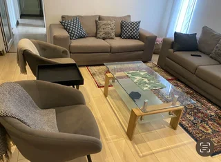Stylish Grey Fabric Lounge Suite with Glass Coffee Table