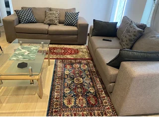 Stylish Grey Fabric Lounge Suite with Glass Coffee Table