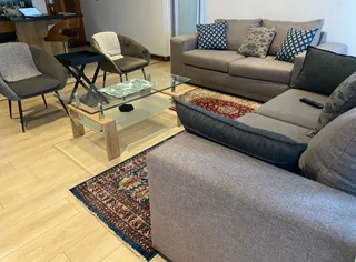 Stylish Grey Fabric Lounge Suite with Glass Coffee Table