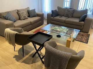 Stylish Grey Fabric Lounge Suite with Glass Coffee Table