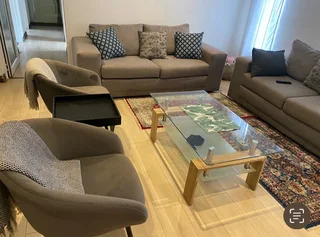 Stylish Grey Fabric Lounge Suite with Glass Coffee Table