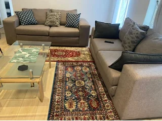 Stylish Grey Fabric Lounge Suite with Glass Coffee Table