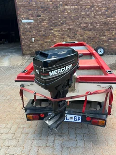 Fishing boat with 15hp mercury motor and trailer