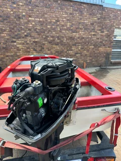 Fishing boat with 15hp mercury motor and trailer