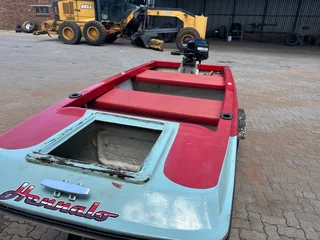 Fishing boat with 15hp mercury motor and trailer