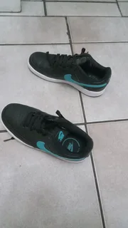 Black and blue Nikes