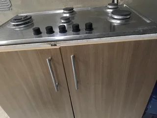 Gas stove and cupboard