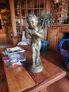 Vintage bronze cherub angel