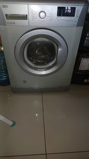 Grey front loader automatic Defy washing machine