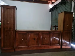 Antique wooden sideboard with long detachable cupboards