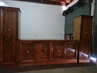 Antique wooden sideboard with long detachable cupboards