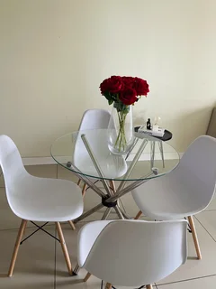 Glass dining table with 4 chairs