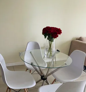Glass dining table with 4 chairs