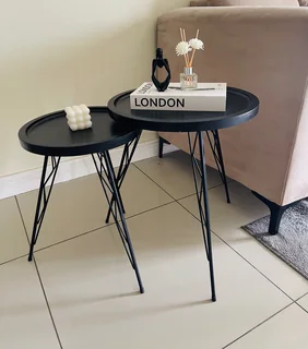 Two black side tables