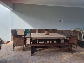 Garden patio table-baught at Wethearlys8 seaterCane and solid wood