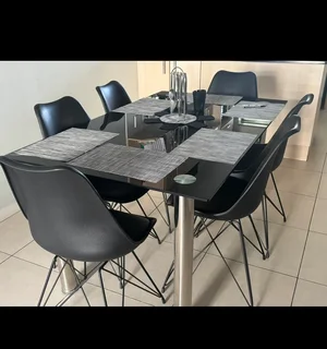 6 seater glass dinner table and chairs