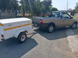 Fiat buckie strada with a trailler and canopy