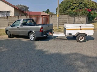 Fiat buckie strada with a trailler and canopy