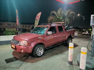 2004 Nissan Hardbody Double Cab Tow truck For Sale