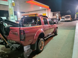 2004 Nissan Hardbody Double Cab Tow truck For Sale