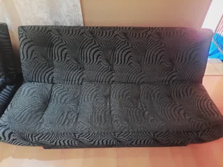 Sleeper couch it can be turned into a bed when needed.