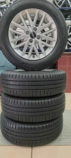A set of 15inch Kia Rio mags and tyres for sale