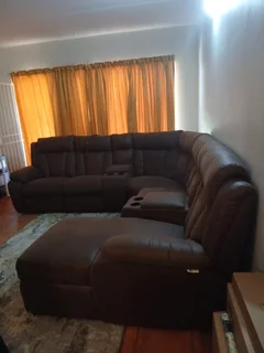 Brown corner coach with one recliner